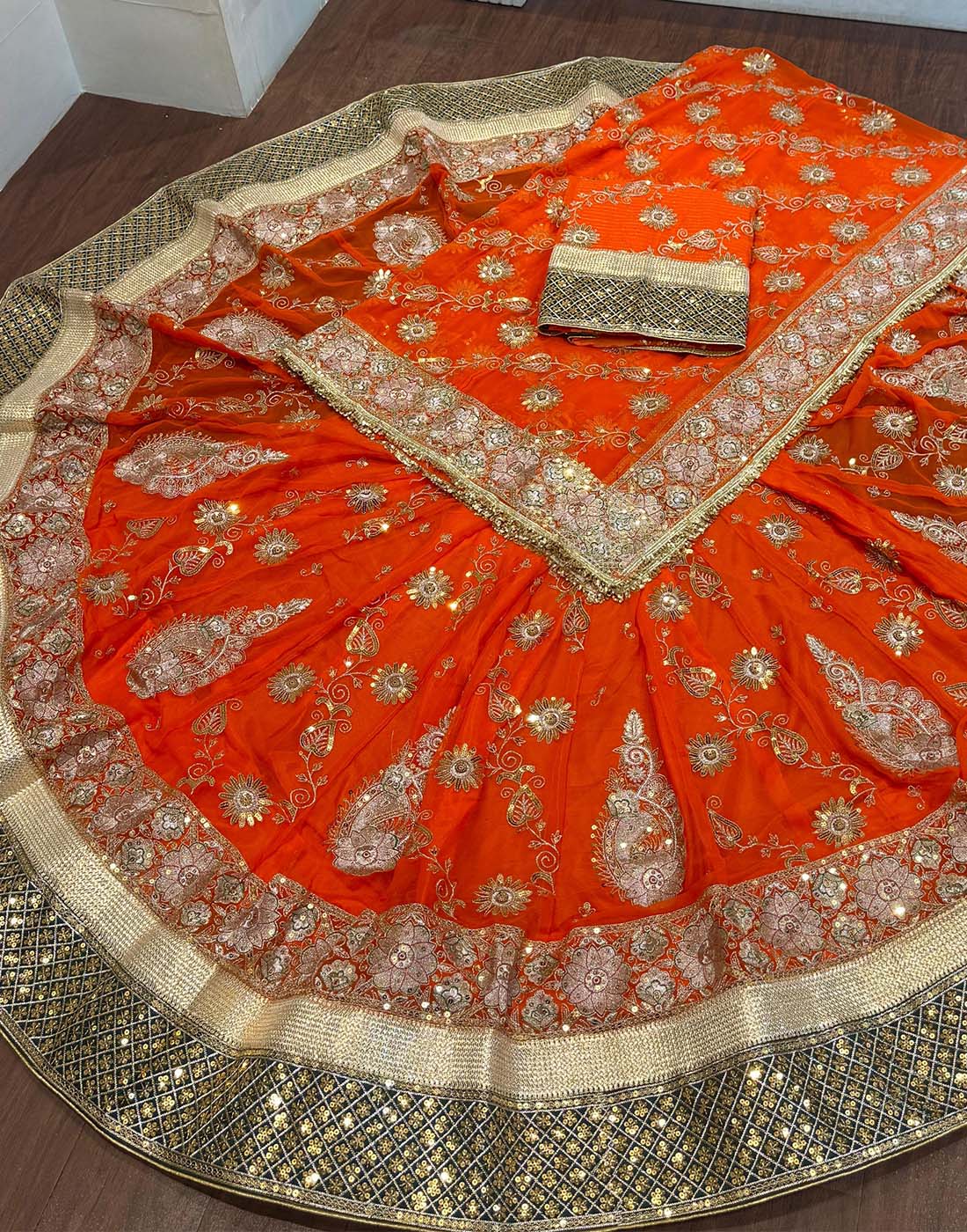 Canvas Poshak in Orange Color with 6.5 Meter Gher Lehanga